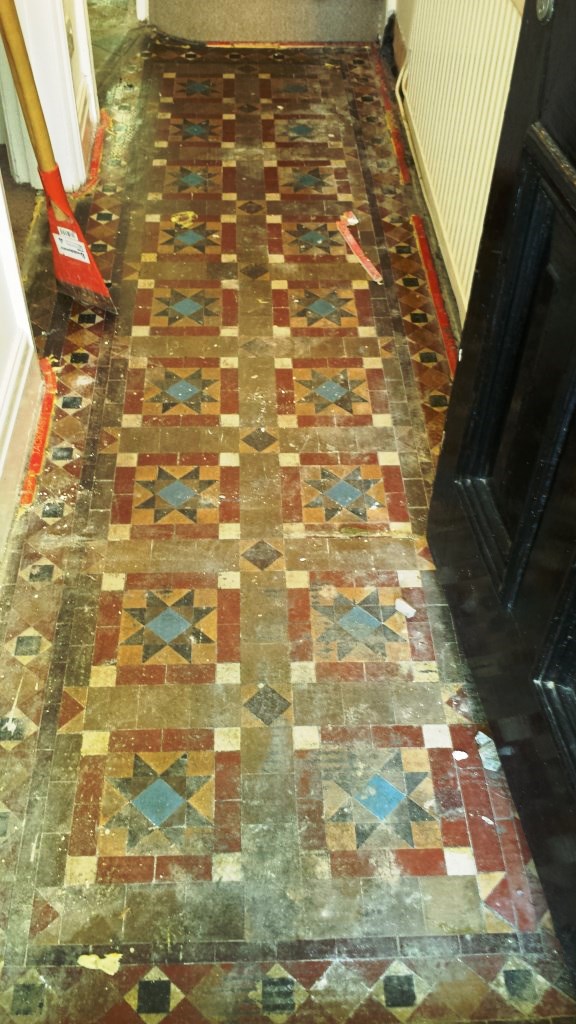 Victorian Tiled Floor Hidden Under Carpet in Splot