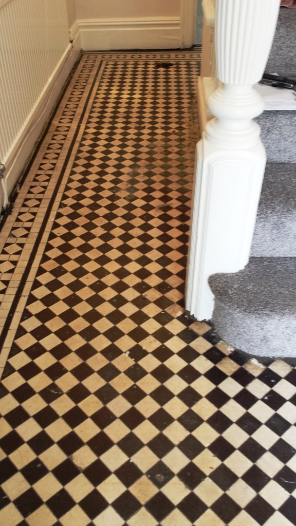 Black and white chequer Victorian Tiles Cardiff Before