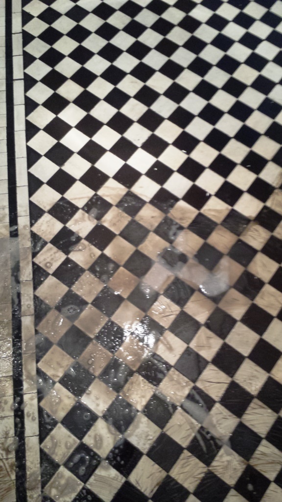 Black and white chequer Victorian Tiles Cardiff During Cleaning