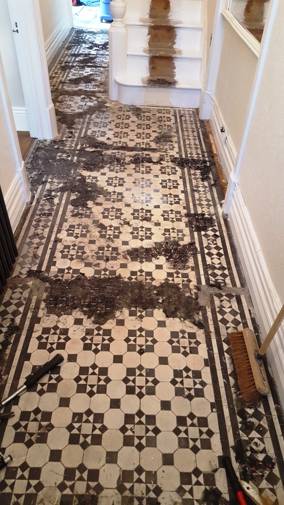 Victorian tiled hallway before cleaning Maesteg
