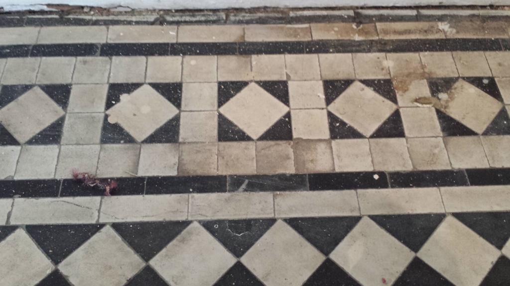 Black and white chequer Victorian Tiles Cardiff Before