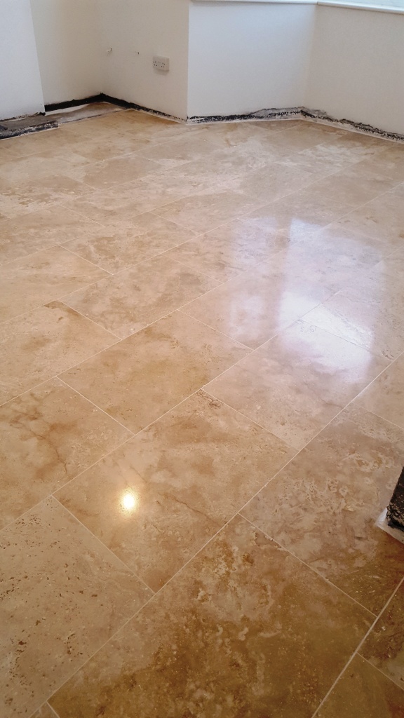 Uneven Travertine Floor After Levelling and Polishing in Swansea