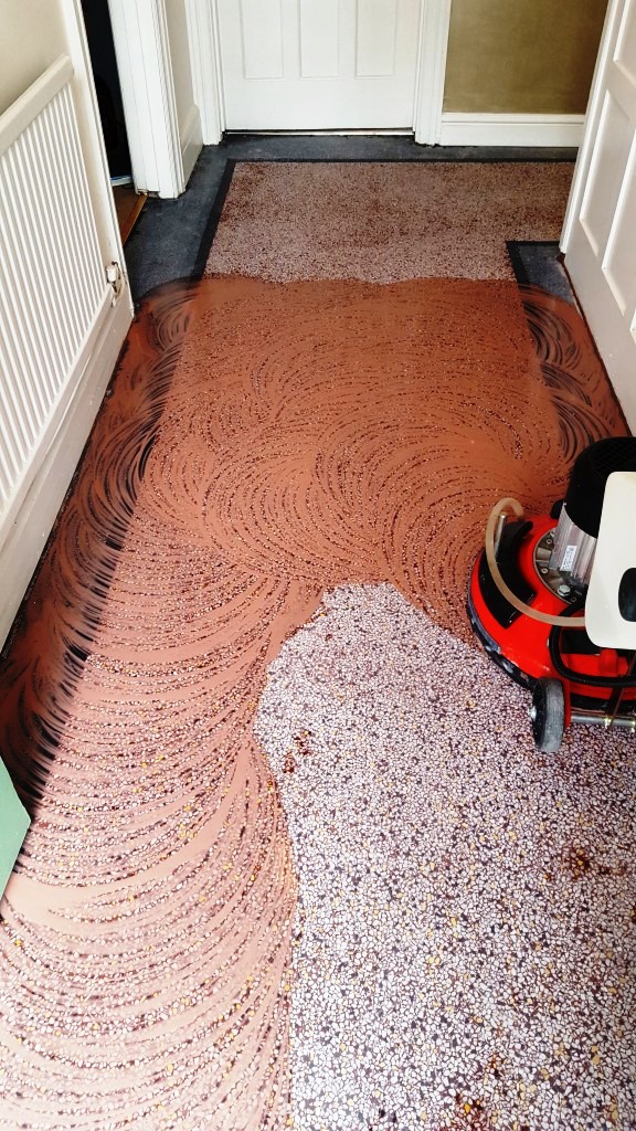 Old terrazzo hallway floor during polishing Bridgend