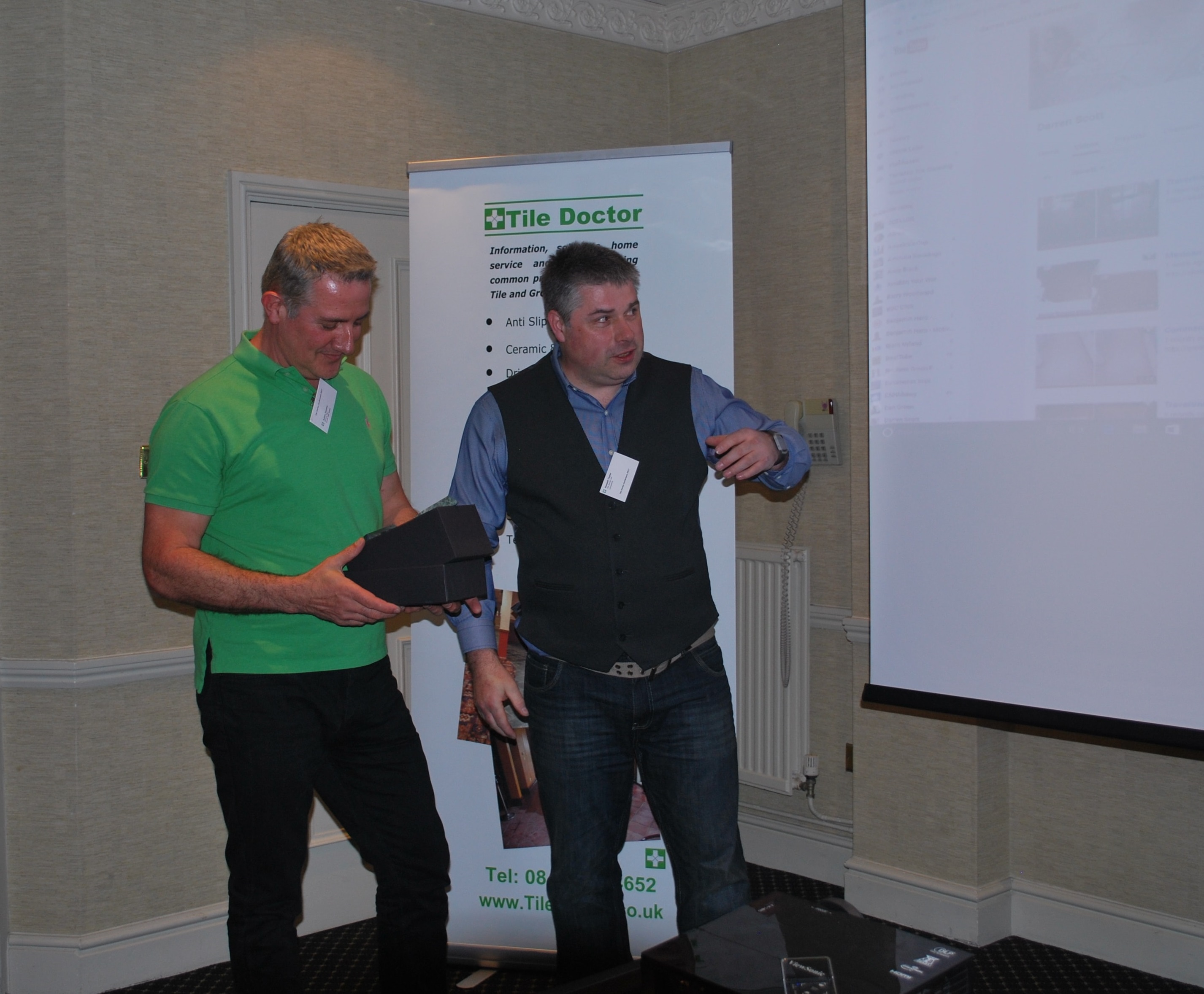 Julian Iacono being awarded the Best Restoration Award by Tile Doctor Director Russell Taylor