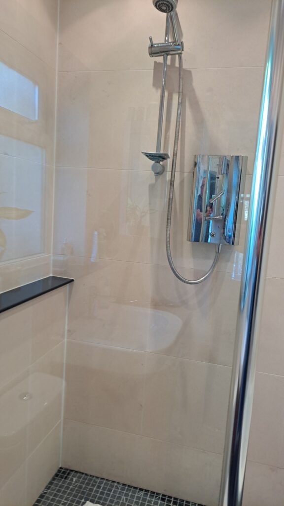 Limestone Shower Wall Tiling After Renovation Cowbridge